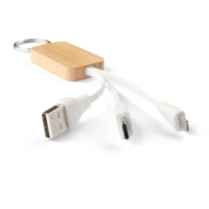 Chaveiro com cabo para carregamento USB-A a lightning (Iphone) e Tipo C com capa de bambu. Como o bambu é um material natural, a cor do item pode variar.